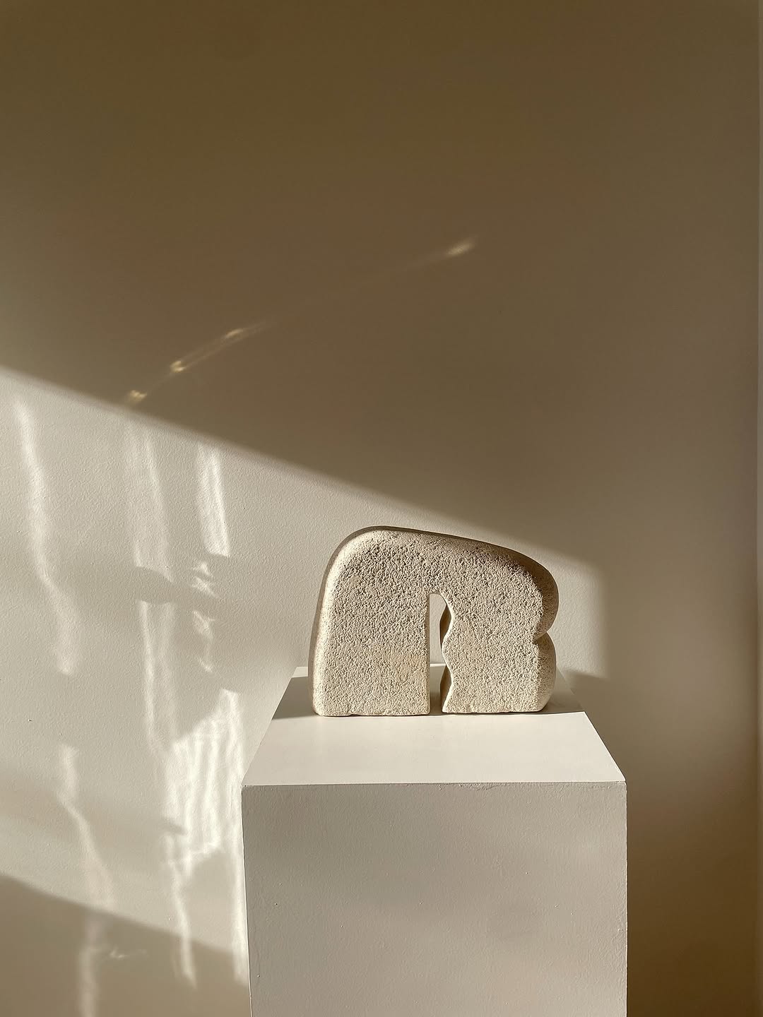 Dekatria sculpture in limestone